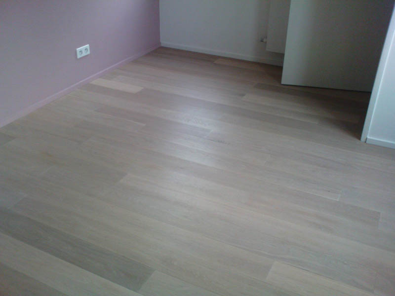 Pose parquet chêne chambre